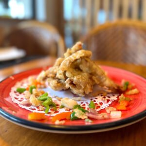 CORDERO REBOZADO A LA SAL Y PIMIENTA